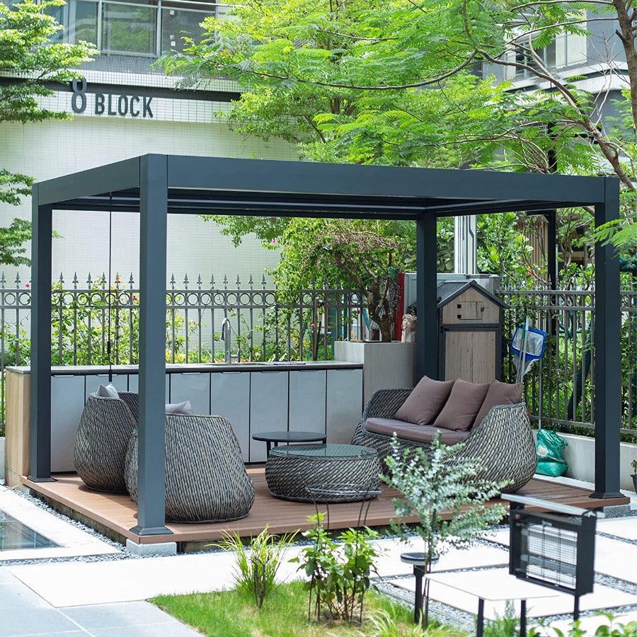 Grey Purple Leaf Caesar manual louvered pergola over a decked courtyard seating area, a typical mid-market aluminum kit